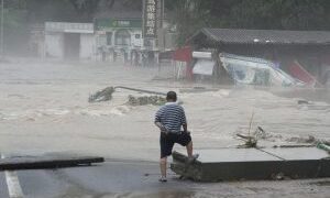 Beijing, China, Experiences Severe Summer Flooding, Leaving 20 People Dead And 27 Missing