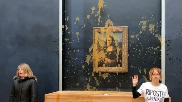 Pumpkin soup hurled at the renowned Mona Lisa in an effort to protect the environment